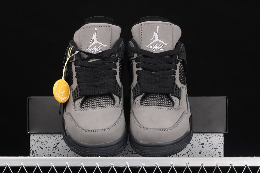 Travis Scott Wears A New Dark Grey Air Jordan 4 •